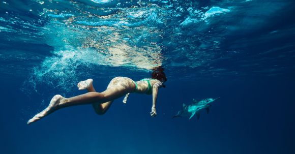 Snorkeling - Woman Swimming Underwater with a Shark