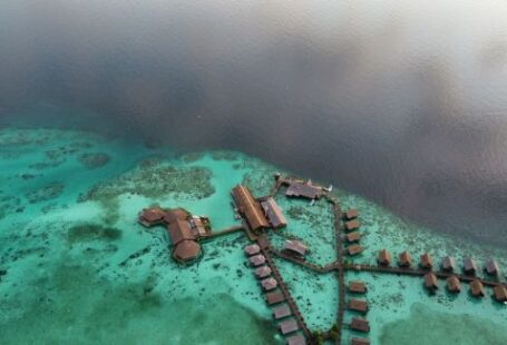 Shipwrecks For Diving - an aerial view of a resort on a tropical island